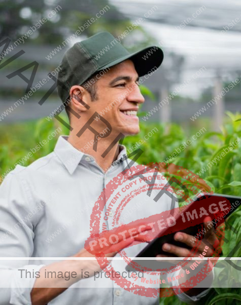 Brazilian man working and using technology in the field